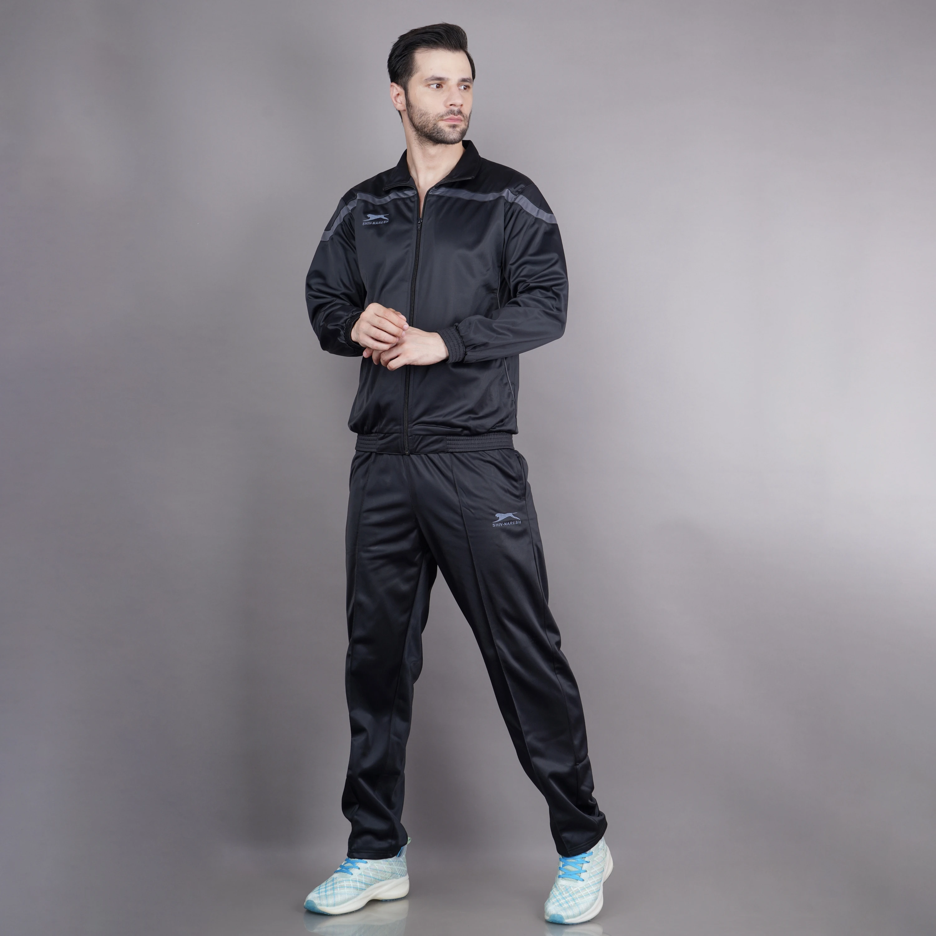 Men's black and dark grey athletic tracksuit