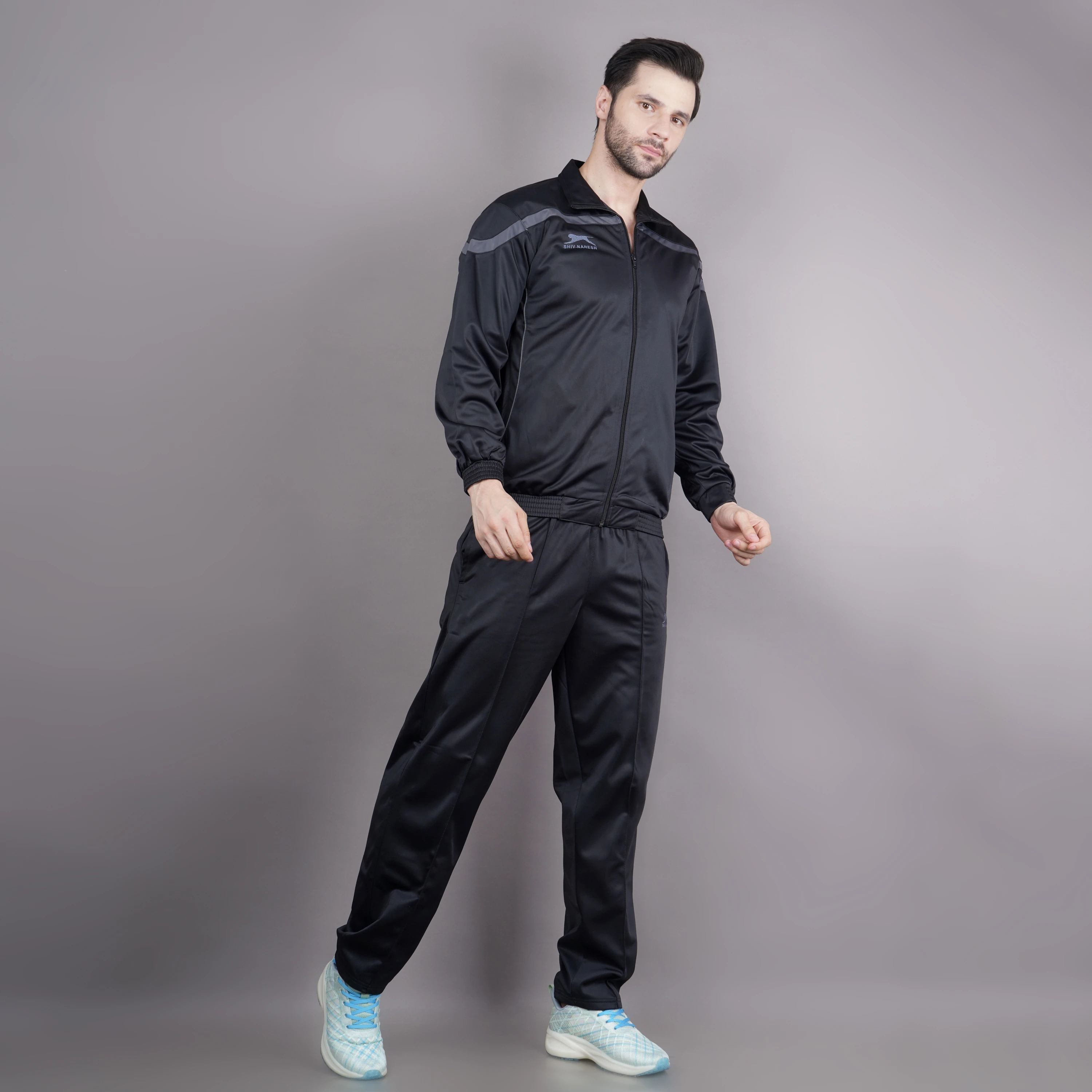 Men's black and dark grey athletic tracksuit